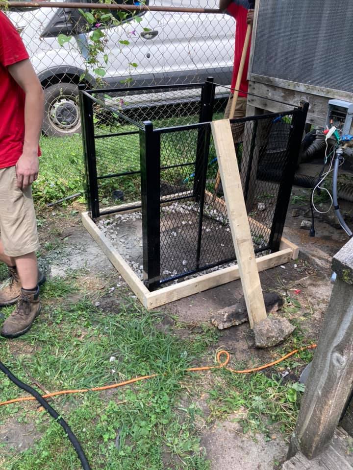 HVAC installation around outdoor AC unit in Florissant, MO.