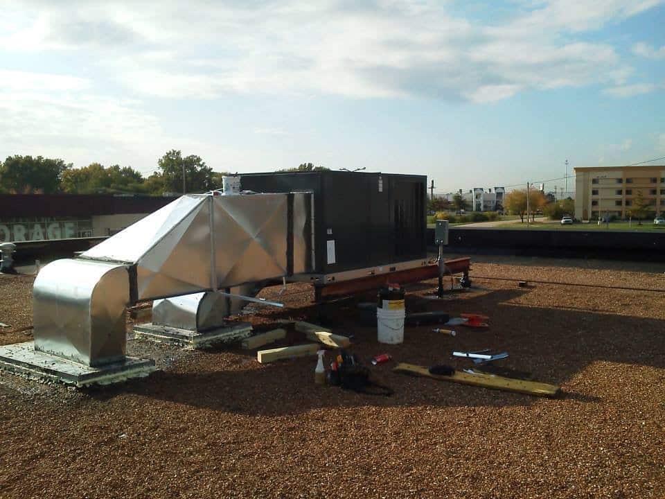 Rooftop HVAC system installation for ductless mini split installation in Florissant, MO.