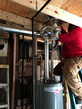 Water heater installation and vent connection in Paddock Forest, MO.