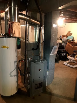 HVAC system and water heater setup in St. Louis, MO.